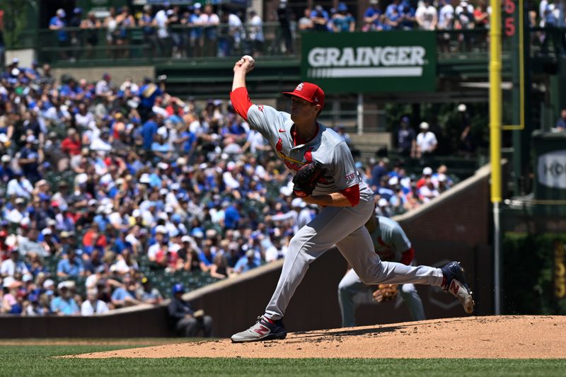 Jun 14, 2024; Chicago, Illinois, USA;  St. Louis Cardinals pitcher Kyle Gibson delivers during the first inning against the Chicago Cubs at  Wrigley Field. Mandatory Credit: Matt Marton-USA TODAY Sports