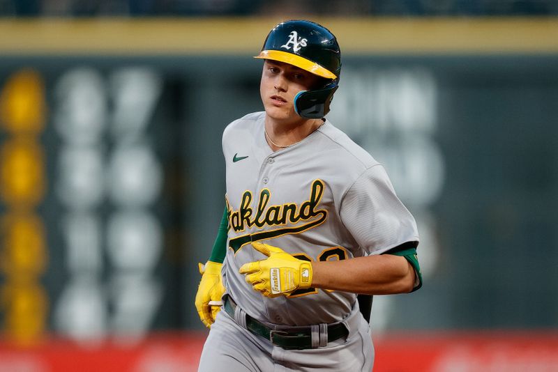 Jul 28, 2023; Denver, Colorado, USA; Oakland Athletics second baseman Zack Gelof (20) rounds the bases on a two run home run in the fifth inning against the Colorado Rockies at Coors Field. Mandatory Credit: Isaiah J. Downing-USA TODAY Sports