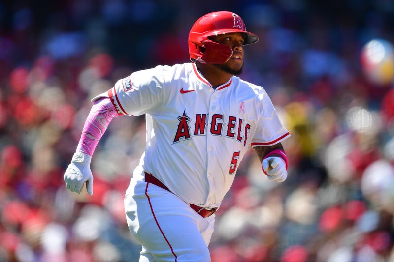 May 12, 2024; Anaheim, California, USA; Los Angeles Angels designated hitter Willie Calhoun (5) runs after hitting an RBI double against the Kansas City Royals during the sixth inning at Angel Stadium. Mandatory Credit: Gary A. Vasquez-USA TODAY Sports