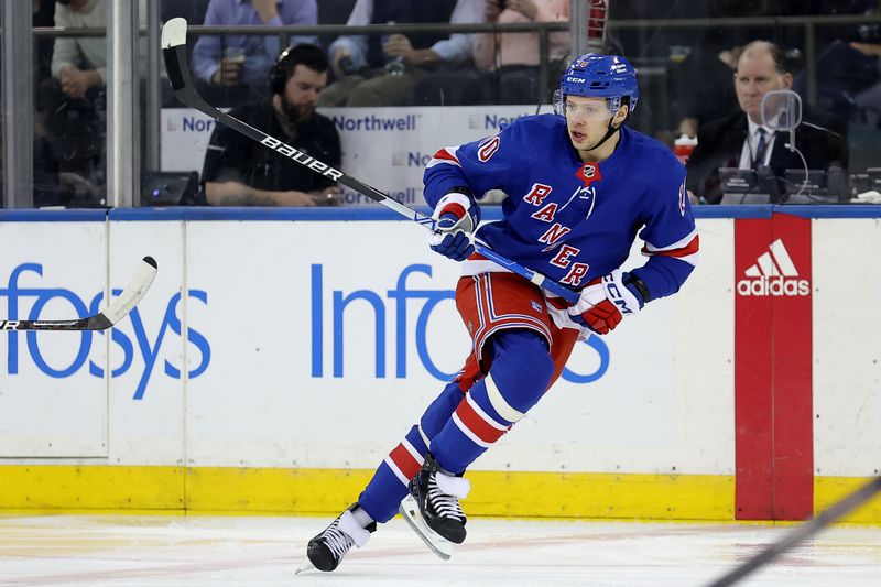 Jan 16, 2024; New York, New York, USA; New York Rangers left wing Artemi Panarin (10) skates against the Seattle Kraken during the first period at Madison Square Garden. Mandatory Credit: Brad Penner-USA TODAY Sports