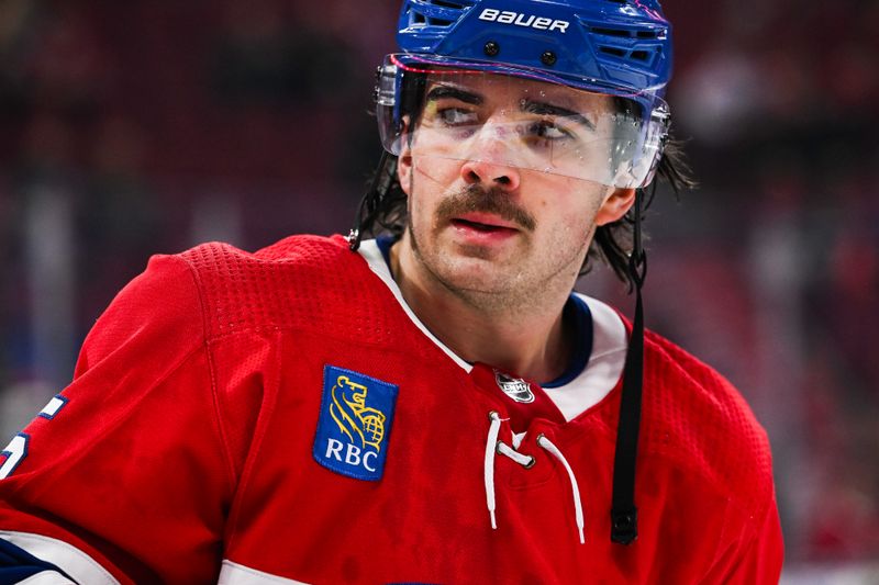 Nov 12, 2023; Montreal, Quebec, CAN; Montreal Canadiens center Alex Newhook (15) looks on during warm-up before the game against the Vancouver Canucks at Bell Centre. Mandatory Credit: David Kirouac-USA TODAY Sports