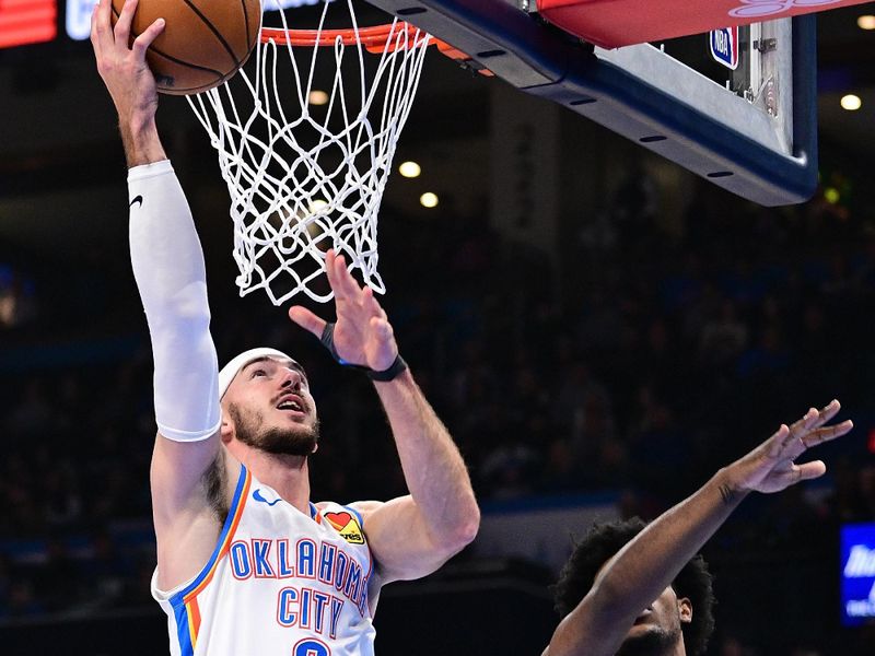 OKLAHOMA CITY, OKLAHOMA - NOVEMBER 20: Alex Caruso #9 of the Oklahoma City Thunder goes to the rim during the first half against the Portland Trail Blazers at Paycom Center on November 20, 2024 in Oklahoma City, Oklahoma. NOTE TO USER: User expressly acknowledges and agrees that, by downloading and or using this photograph, User is consenting to the terms and conditions of the Getty Images License Agreement. (Photo by Joshua Gateley/Getty Images)