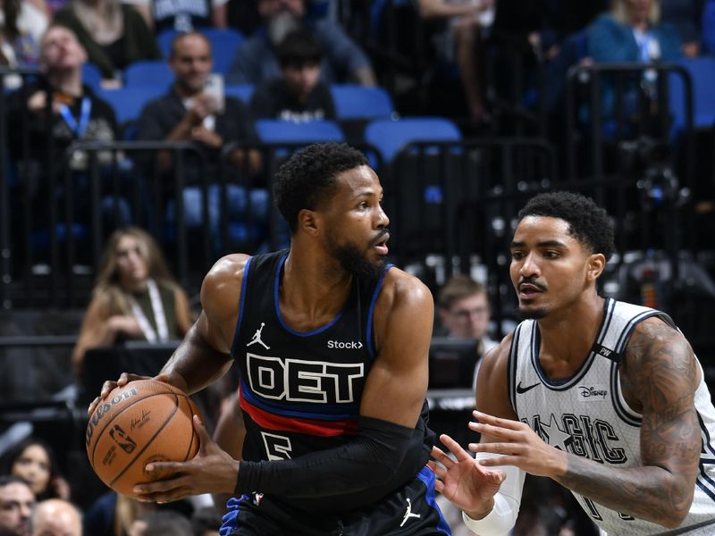 ORLANDO, FL - NOVEMBER 23: Malik Beasley #5 of the Detroit Pistons handles the ball during the game against the Orlando Magic on November 23, 2024 at Kia Center in Orlando, Florida. NOTE TO USER: User expressly acknowledges and agrees that, by downloading and or using this photograph, User is consenting to the terms and conditions of the Getty Images License Agreement. Mandatory Copyright Notice: Copyright 2024 NBAE (Photo by Fernando Medina/NBAE via Getty Images)