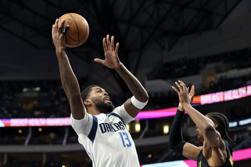 DALLAS, TEXAS - OCTOBER 10: Naji Marshall #13 of the Dallas Mavericks shoots the ball against the Utah Jazz in the first half at American Airlines Center on October 10, 2024 in Dallas, Texas. NOTE TO USER: User expressly acknowledges and agrees that, by downloading and or using this Photograph, user is consenting to the terms and conditions of the Getty Images License Agreement. Mandatory Copyright Notice: Copyright 2024 NBAE (Photo by Tim Heitman/Getty Images)