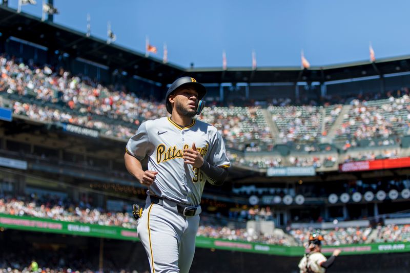 Apr 28, 2024; San Francisco, California, USA;  Pittsburgh Pirates designated hitter Edward Olivares (38) reacts after scoring against the San Francisco Giants during the fifth inning at Oracle Park. Mandatory Credit: John Hefti-USA TODAY Sports