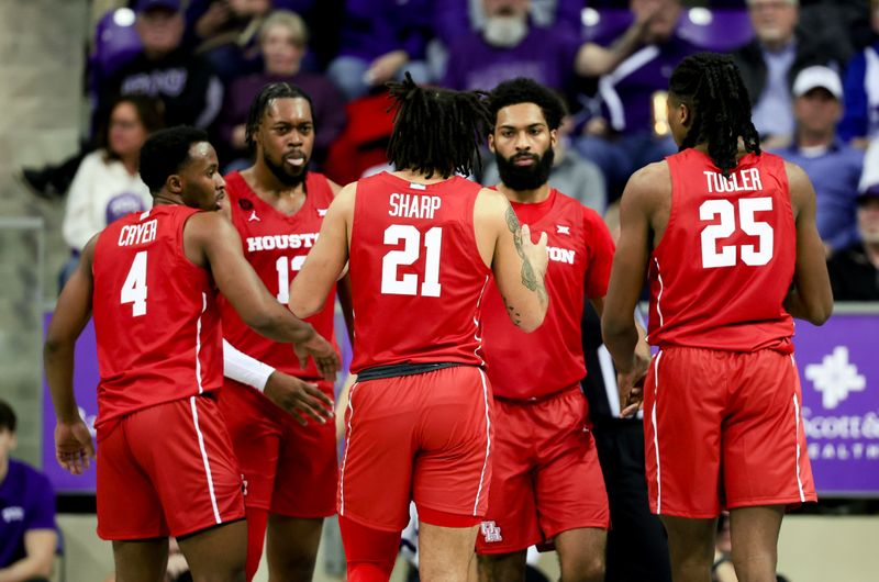 Jan 13, 2024; Fort Worth, Texas, USA;  Houston Cougars guard L.J. Cryer (4) and Houston Cougars forward J'Wan Roberts (13) and Houston Cougars guard Emanuel Sharp (21) and Houston Cougars forward Joseph Tugler (25) and Houston Cougars guard Damian Dunn (11) react during the first half against the TCU Horned Frogs at Ed and Rae Schollmaier Arena. Mandatory Credit: Kevin Jairaj-USA TODAY Sports