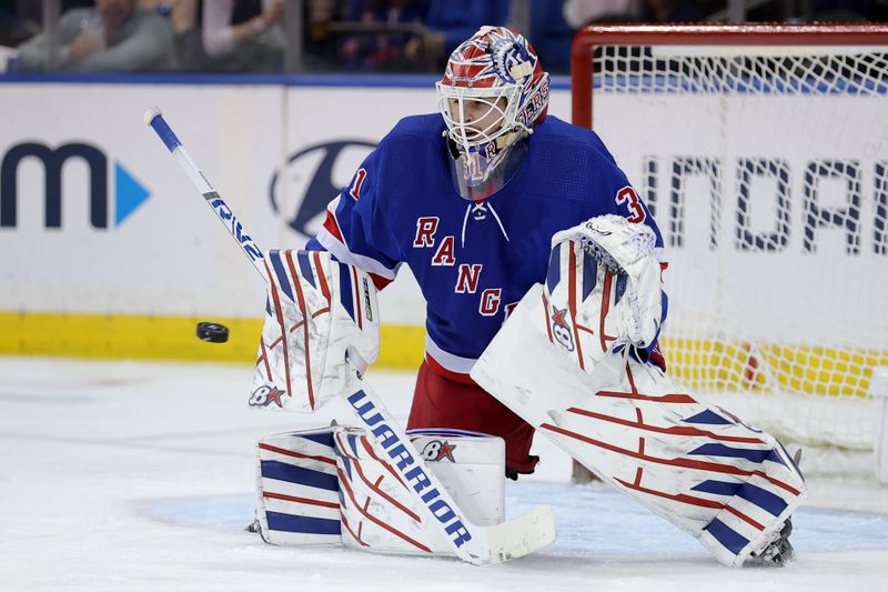 Jan 16, 2024; New York, New York, USA; New York Rangers goaltender Igor Shesterkin (31) makes a save against the Seattle Kraken during the second period at Madison Square Garden. Mandatory Credit: Brad Penner-USA TODAY Sports