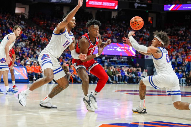 Feb 17, 2024; Boise, Idaho, USA; Boise State Broncos guard Roddie Anderson III (0) steals the ball from Fresno State Bulldogs guard Jalen Weaver (5) during the first half  at ExtraMile Arena. Mandatory Credit: Brian Losness-USA TODAY Sports

