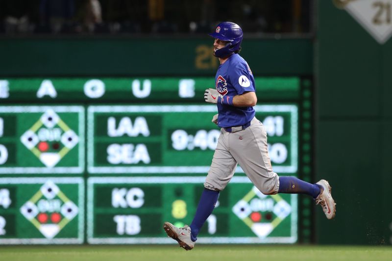 Apr 29, 2025; Pittsburgh, Pennsylvania, USA;  Chicago Cubs shortstop Dansby Swanson (7) circles the bases after a solo home run against the Pittsburgh Pirates during the eighth inning at PNC Park. Mandatory Credit: Charles LeClaire-Imagn Images