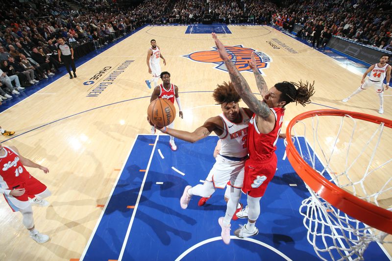 NEW YORK, NY - JANUARY 27: Miles McBride #2 of the New York Knicks drives to the basket during the game against the Memphis Grizzlies on January 27, 2025 at Madison Square Garden in New York City, New York.  NOTE TO USER: User expressly acknowledges and agrees that, by downloading and or using this photograph, User is consenting to the terms and conditions of the Getty Images License Agreement. Mandatory Copyright Notice: Copyright 2025 NBAE  (Photo by Nathaniel S. Butler/NBAE via Getty Images)