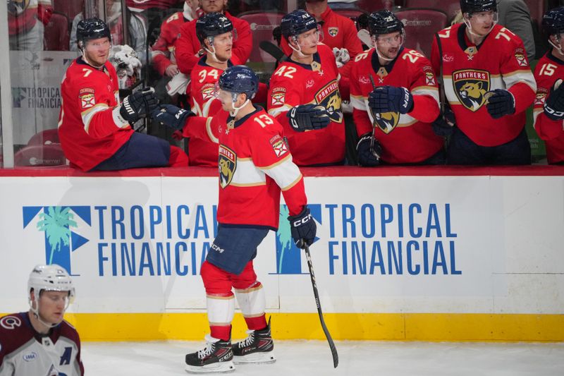 Nov 23, 2024; Sunrise, Florida, USA;  Florida Panthers center Sam Reinhart (13) celebrates a goal in the second period against the Colorado Avalanche at Amerant Bank Arena. Mandatory Credit: Jim Rassol-Imagn Images