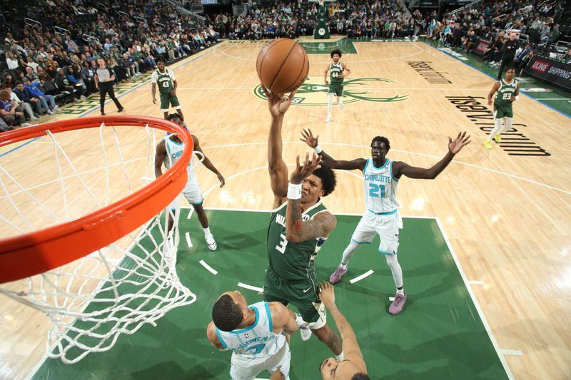 MILWAUKEE, WI - FEBRUARY 9: MarJon Beauchamp #3 of the Milwaukee Bucks drives to the basket during the game against the Charlotte Hornets on February 9, 2024 at the Fiserv Forum Center in Milwaukee, Wisconsin. NOTE TO USER: User expressly acknowledges and agrees that, by downloading and or using this Photograph, user is consenting to the terms and conditions of the Getty Images License Agreement. Mandatory Copyright Notice: Copyright 2024 NBAE (Photo by Gary Dineen/NBAE via Getty Images).