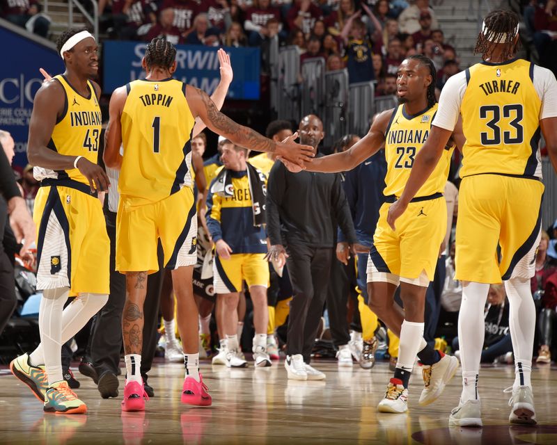 CLEVELAND, OH - MAY 4:  Obi Toppin #1 and Aaron Nesmith #23 of the Indiana Pacers high five during the game against the Cleveland Cavaliers during Round 2 Game 1 of the 2025 NBA Playoffs on May 4, 2025 at Rocket Arena in Cleveland, Ohio. NOTE TO USER: User expressly acknowledges and agrees that, by downloading and/or using this Photograph, user is consenting to the terms and conditions of the Getty Images License Agreement. Mandatory Copyright Notice: Copyright 2025 NBAE (Photo by David Liam Kyle/NBAE via Getty Images)