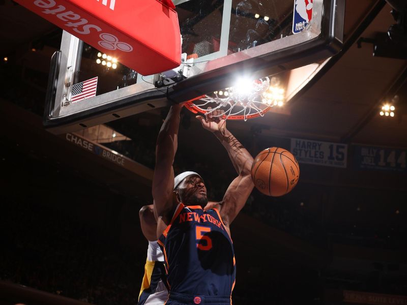 NEW YORK, NY - FEBRUARY 1: Precious Achiuwa #5 of the New York Knicks dunks the ball during the game against the Indiana Pacers on February 1, 2024 at Madison Square Garden in New York City, New York.  NOTE TO USER: User expressly acknowledges and agrees that, by downloading and or using this photograph, User is consenting to the terms and conditions of the Getty Images License Agreement. Mandatory Copyright Notice: Copyright 2024 NBAE  (Photo by Nathaniel S. Butler/NBAE via Getty Images)