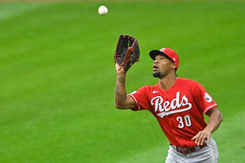 Sep 26, 2023; Cleveland, Ohio, USA; Cincinnati Reds right fielder Will Benson (30) makes a catch in the second inning against the Cleveland Guardians at Progressive Field. Mandatory Credit: David Richard-USA TODAY Sports