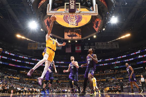 LOS ANGELES, CA - NOVEMBER 15: Anthony Davis #3 of the Los Angeles Lakers drives to the basket during the game against the Sacramento Kings on November 15, 2023 at Crypto.Com Arena in Los Angeles, California. NOTE TO USER: User expressly acknowledges and agrees that, by downloading and/or using this Photograph, user is consenting to the terms and conditions of the Getty Images License Agreement. Mandatory Copyright Notice: Copyright 2023 NBAE (Photo by Adam Pantozzi/NBAE via Getty Images)