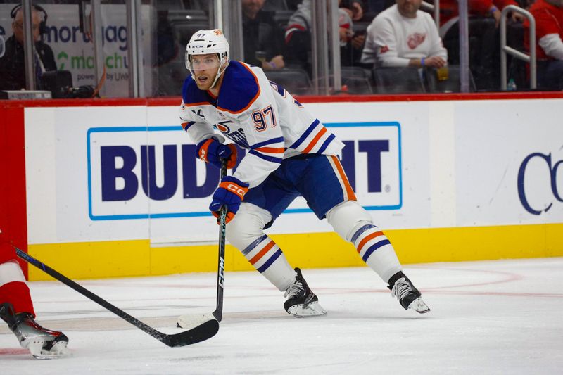 Oct 27, 2024; Detroit, Michigan, USA; Edmonton Oilers center Connor McDavid (97) handles the puck during the first period against the Detroit Red Wings at Little Caesars Arena. Mandatory Credit: Brian Bradshaw Sevald-Imagn Images