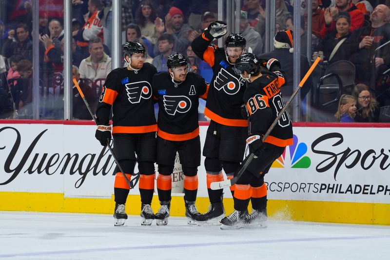 Nov 29, 2024; Philadelphia, Pennsylvania, USA; Philadelphia Flyers right wing Travis Konecny (11) celebrates with teammates after scoring a goal against the New York Rangers in the first period at Wells Fargo Center. Mandatory Credit: Kyle Ross-Imagn Images