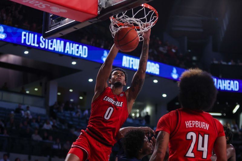 Feb 1, 2025; Atlanta, Georgia, USA; Louisville Cardinals forward James Scott (0) dunks over Georgia Tech Yellow Jackets forward Ibrahim Souare (30) in the first half at McCamish Pavilion. Mandatory Credit: Brett Davis-Imagn Images