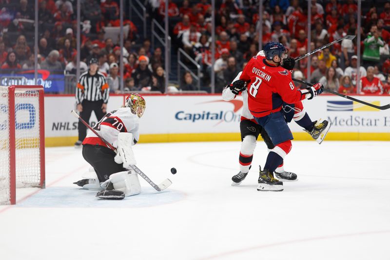 Apr 7, 2024; Washington, District of Columbia, USA; Ottawa Senators goaltender Joonas Korpisalo (70) makes a save on Washington Capitals left wing Alex Ovechkin (8) in the third period at Capital One Arena. Mandatory Credit: Geoff Burke-USA TODAY Sports