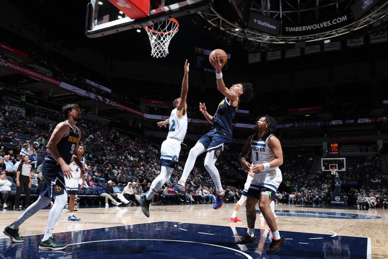 MINNEAPOLIS, MN -  OCTOBER 17: Julian Strawther #3 of the Denver Nuggets drives to the basket during the game against the Minnesota Timberwolves during the 2024 NBA Preseason on October 17, 2024 at Target Center in Minneapolis, Minnesota. NOTE TO USER: User expressly acknowledges and agrees that, by downloading and or using this Photograph, user is consenting to the terms and conditions of the Getty Images License Agreement. Mandatory Copyright Notice: Copyright 2024 NBAE (Photo by David Sherman/NBAE via Getty Images)