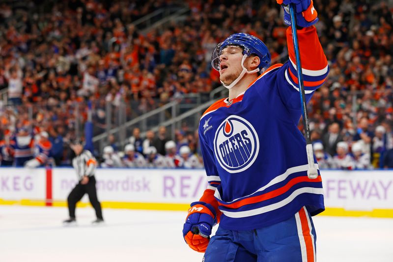 Nov 23, 2024; Edmonton, Alberta, CAN; Edmonton Oilers forward Vasily Podkolzin (92) celebrates after scoring a goal during the first period against the New York Rangers at Rogers Place. Mandatory Credit: Perry Nelson-Imagn Images