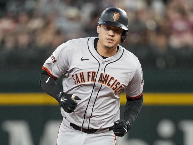 Jun 7, 2024; Arlington, Texas, USA; San Francisco Giants first baseman Wilmer Flores (41) circles the bases on his solo home run against the Texas Rangers during the second inning at Globe Life Field. Mandatory Credit: Jim Cowsert-USA TODAY Sports