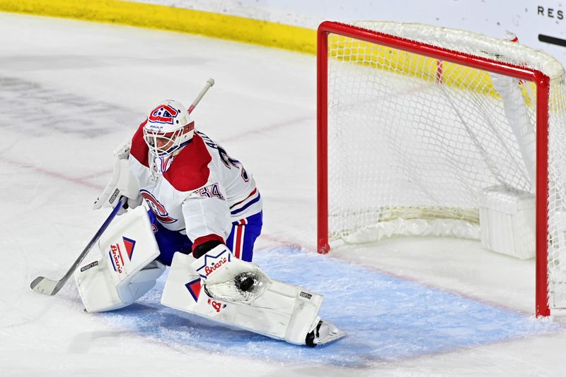 Nov 2, 2023; Tempe, Arizona, USA;  Montreal Canadiens goaltender Jake Allen (34) makes a save in the third period against the Arizona Coyotes at Mullett Arena. Mandatory Credit: Matt Kartozian-USA TODAY Sports