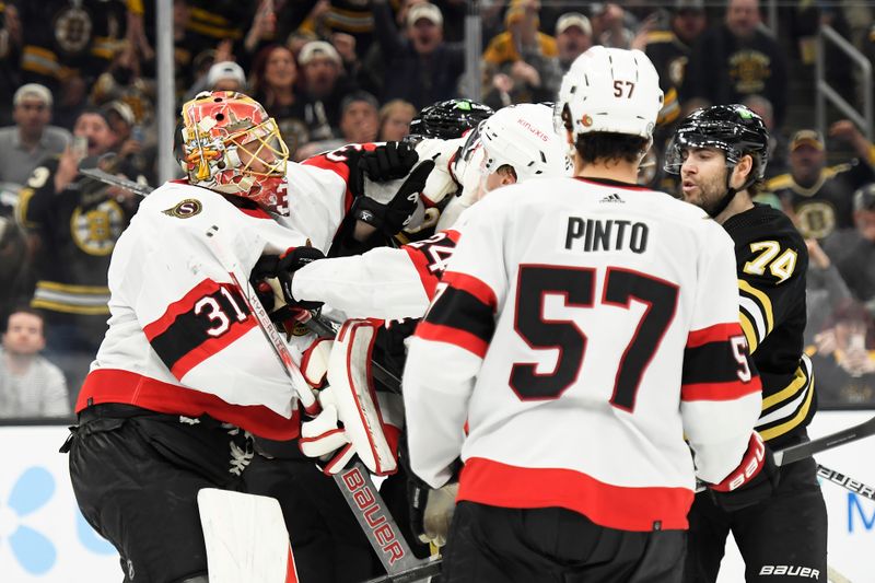 Apr 16, 2024; Boston, Massachusetts, USA;  Ottawa Senators goaltender Anton Forsberg (31) throws a punch at Boston Bruins center Trent Frederic (11) during the third period at TD Garden. Mandatory Credit: Bob DeChiara-USA TODAY Sports