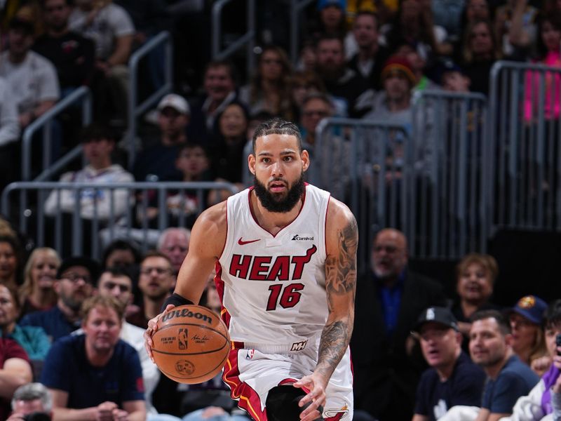 DENVER, CO - FEBRUARY 29: Caleb Martin #16 of the Miami Heat dribbles the ball during the game against the Denver Nuggets on February 29, 2024 at the Ball Arena in Denver, Colorado. NOTE TO USER: User expressly acknowledges and agrees that, by downloading and/or using this Photograph, user is consenting to the terms and conditions of the Getty Images License Agreement. Mandatory Copyright Notice: Copyright 2024 NBAE (Photo by Garrett Ellwood/NBAE via Getty Images)