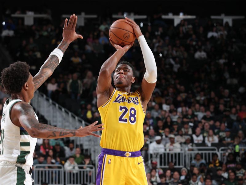 MILWAUKEE, WI - OCTOBER 10: Rui Hachimura #28 of the Los Angeles Lakers shoots the ball during the game against the Milwaukee Bucks during a preseason game on October 10, 2024 at Fiserv Forum Center in Milwaukee, Wisconsin. NOTE TO USER: User expressly acknowledges and agrees that, by downloading and or using this Photograph, user is consenting to the terms and conditions of the Getty Images License Agreement. Mandatory Copyright Notice: Copyright 2024 NBAE (Photo by Gary Dineen/NBAE via Getty Images).