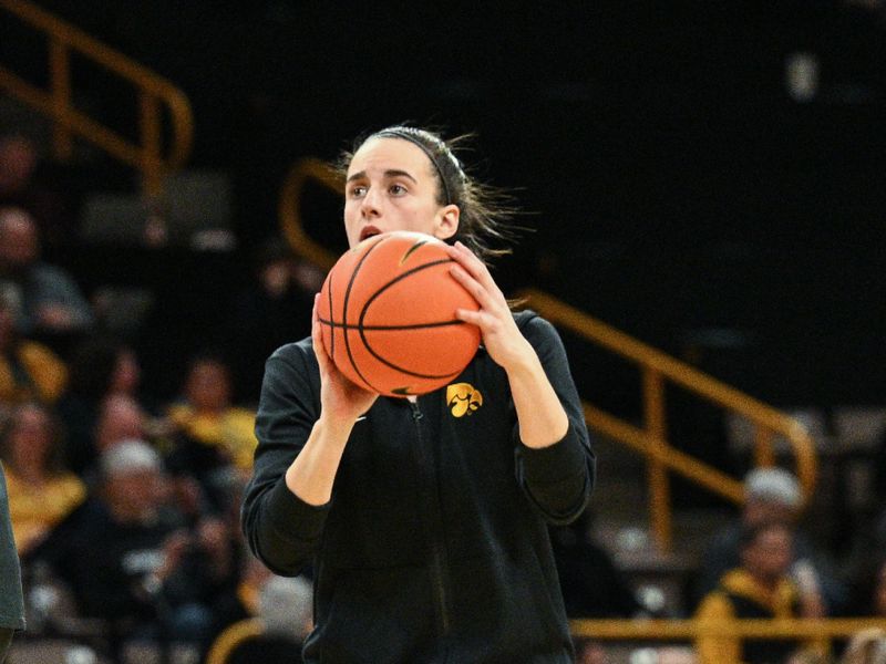 Feb 8, 2024; Iowa City, Iowa, USA; Iowa Hawkeyes guard Caitlin Clark (22) warms up before the game against the Penn State Nittany Lions at Carver-Hawkeye Arena. Mandatory Credit: Jeffrey Becker-USA TODAY Sports