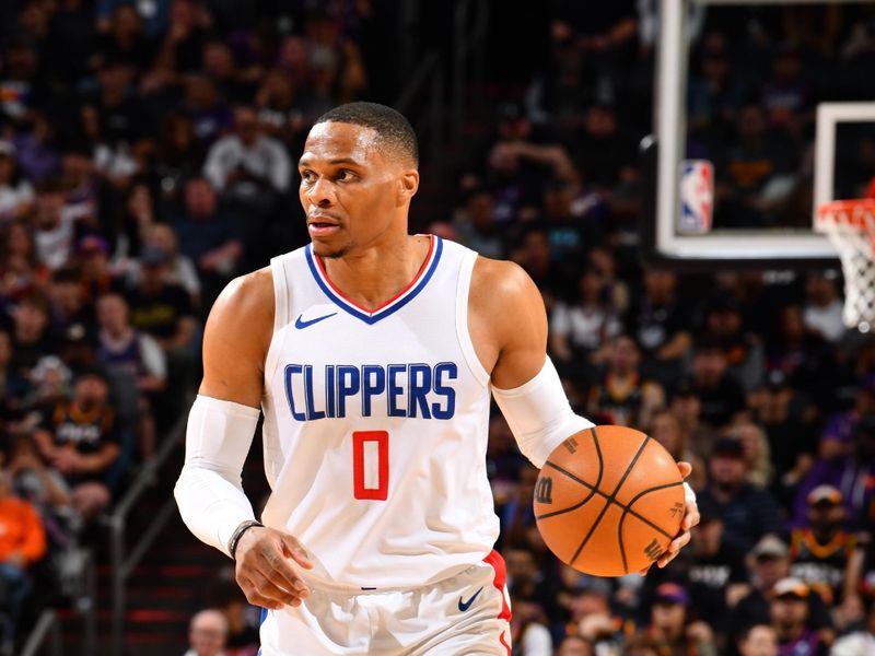 PHOENIX, AZ - APRIL 9:  Russell Westbrook #0 of the LA Clippers handles the ball during the game  on April 9, 2024 at Footprint Center in Phoenix, Arizona. NOTE TO USER: User expressly acknowledges and agrees that, by downloading and or using this photograph, user is consenting to the terms and conditions of the Getty Images License Agreement. Mandatory Copyright Notice: Copyright 2024 NBAE (Photo by Barry Gossage/NBAE via Getty Images)