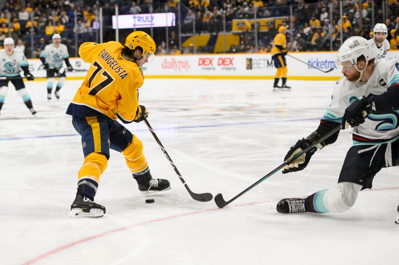 Mar 6, 2025; Nashville, Tennessee, USA;  Seattle Kraken defenseman Brandon Montour (62) pokes the puck from Nashville Predators right wing Luke Evangelista (77) during the third period at Bridgestone Arena. Mandatory Credit: Steve Roberts-Imagn Images