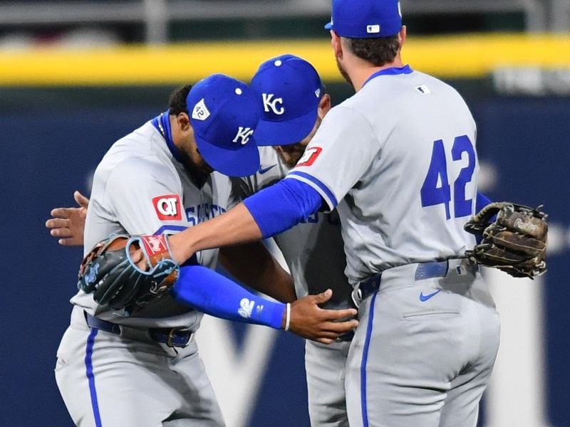 Apr 15, 2024; Chicago, Illinois, USA; (from left to right) Kansas City Royals left fielder MJ Melendez, center fielder Kyle Isbel, and right fielder Hunter Renfroe celebrate after defeating the Chicago White Sox at Guaranteed Rate Field. Mandatory Credit: Patrick Gorski-USA TODAY Sports