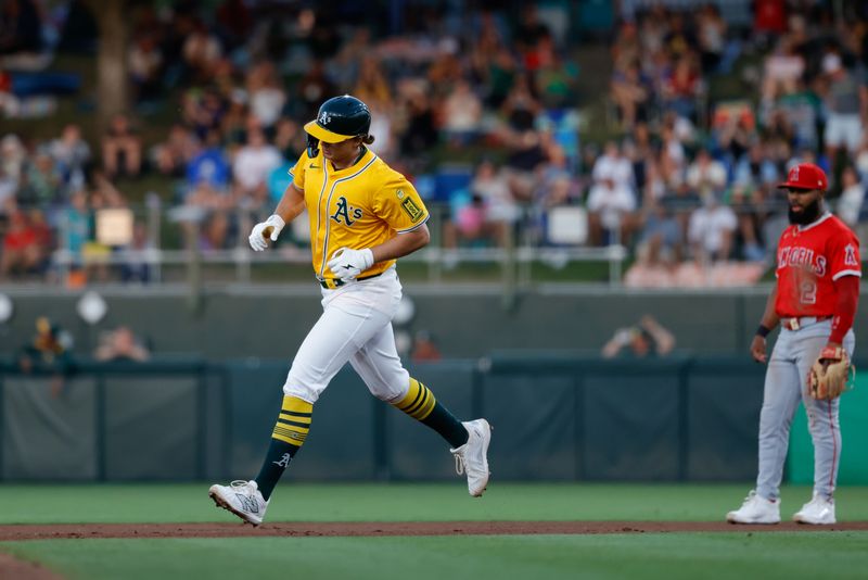 May 20, 2025; West Sacramento, California, USA; Athletics first baseman Nick Kurtz (16) runs the bases after hitting a two run home run against the Los Angeles Angels during the fourth inning at Sutter Health Park. Mandatory Credit: Sergio Estrada-Imagn Images