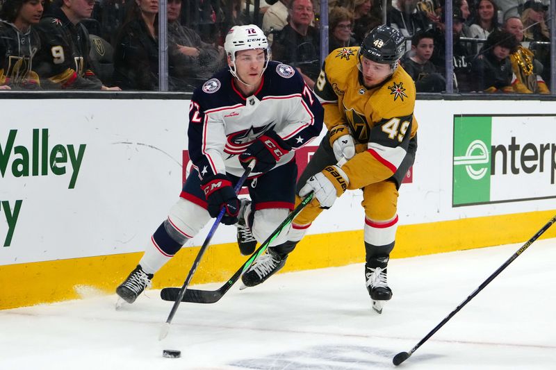 Mar 23, 2024; Las Vegas, Nevada, USA; Columbus Blue Jackets right wing Carson Meyer (72) skates ahead of Vegas Golden Knights center Ivan Barbashev (49) during the first period at T-Mobile Arena. Mandatory Credit: Stephen R. Sylvanie-USA TODAY Sports