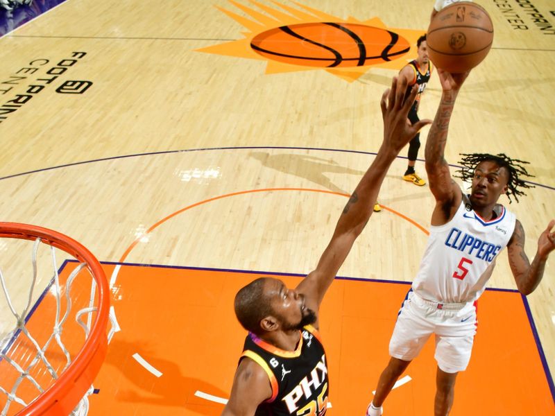 PHOENIX, AZ - APRIL 18: Bones Hyland #5 of the LA Clippers shoots the ball during the game against the Phoenix Suns during Round 1 Game 2 of the 2023 NBA Playoffs on April 18, 2023 at Footprint Center in Phoenix, Arizona. NOTE TO USER: User expressly acknowledges and agrees that, by downloading and or using this photograph, user is consenting to the terms and conditions of the Getty Images License Agreement. Mandatory Copyright Notice: Copyright 2023 NBAE (Photo by Barry Gossage/NBAE via Getty Images)