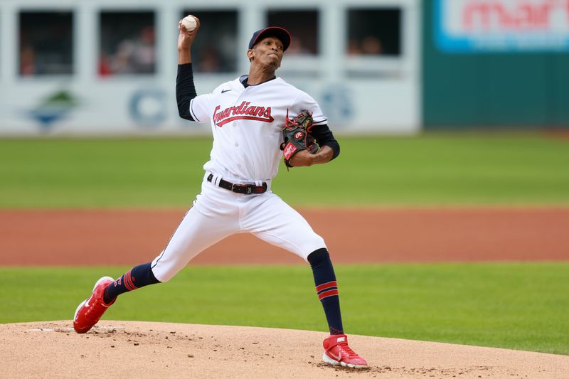 Sep 24, 2023; Cleveland, Ohio, USA; Cleveland Guardians starting pitcher Triston McKenzie (11) pitches against the Baltimore Orioles during the first inning at Progressive Field. Mandatory Credit: Aaron Josefczyk-USA TODAY Sports