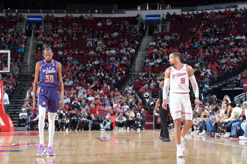 HOUSTON, TX - FEBRUARY 23:   Kevin Durant #35 of the Phoenix Suns and Dillon Brooks #9 of the Houston Rockets looks on during the game against the Houston Rockets on February 23, 2024 at the Toyota Center in Houston, Texas. NOTE TO USER: User expressly acknowledges and agrees that, by downloading and or using this photograph, User is consenting to the terms and conditions of the Getty Images License Agreement. Mandatory Copyright Notice: Copyright 2024 NBAE (Photo by Logan Riely/NBAE via Getty Images)