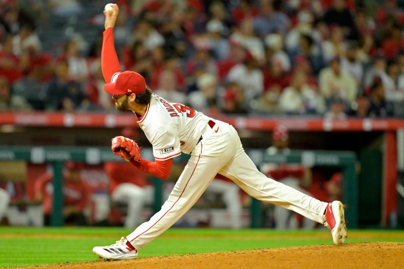 Apr 5, 2025; Anaheim, California, USA;  Los Angeles Angels relief pitcher Joey Cantillo (54) delivers to the plate in the ninth inning against the Cleveland Guardians at Angel Stadium. Mandatory Credit: Jayne Kamin-Oncea-Imagn Images