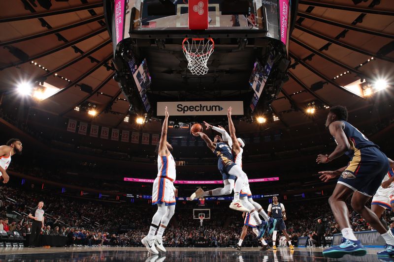 NEW YORK, NY - DECEMBER 1: Dejounte Murray #5 of the New Orleans Pelicans shoots the ball during the game against the New York Knicks on December 1, 2024 at Madison Square Garden in New York City, New York.  NOTE TO USER: User expressly acknowledges and agrees that, by downloading and or using this photograph, User is consenting to the terms and conditions of the Getty Images License Agreement. Mandatory Copyright Notice: Copyright 2024 NBAE  (Photo by Nathaniel S. Butler/NBAE via Getty Images)