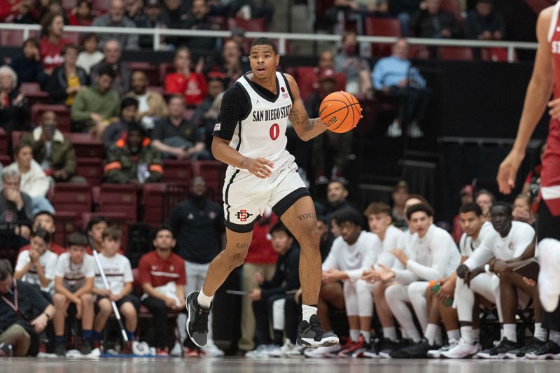 Nov 15, 2022; Stanford, California, USA; San Diego State Aztecs forward Keshad Johnson (0) controls the ball during the first half against the Stanford Cardinal at Maples Pavilion. Mandatory Credit: Stan Szeto-USA TODAY Sports