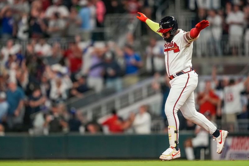 Sep 27, 2023; Cumberland, Georgia, USA; Atlanta Braves designated hitter Marcell Ozuna (20) reacts after hitting a home run against the Chicago Cubs during the ninth inning at Truist Park. Mandatory Credit: Dale Zanine-USA TODAY Sports