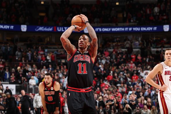 CHICAGO, IL - NOVEMBER 18: DeMar DeRozan #11 of the Chicago Bulls prepares to shoot a free throw during the game against the Miami Heat on November 18, 2023 at United Center in Chicago, Illinois. NOTE TO USER: User expressly acknowledges and agrees that, by downloading and or using this photograph, User is consenting to the terms and conditions of the Getty Images License Agreement. Mandatory Copyright Notice: Copyright 2023 NBAE (Photo by Jeff Haynes/NBAE via Getty Images)