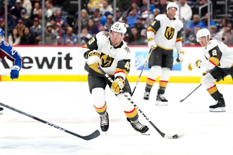 Jan 10, 2024; Denver, Colorado, USA; Vegas Golden Knights center Paul Cotter (43) shoots the puck in the first period against the Colorado Avalanche at Ball Arena. Mandatory Credit: Ron Chenoy-USA TODAY Sports