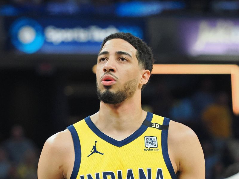 INDIANAPOLIS, IN - APRIL 28: Tyrese Haliburton #0 of the Indiana Pacers prepares to shoot a free throw during the game against the Milwaukee Bucks during Round 1 Game 4 of the 2024 NBA Playoffs on April 28, 2024 at Gainbridge Fieldhouse in Indianapolis, Indiana. NOTE TO USER: User expressly acknowledges and agrees that, by downloading and or using this Photograph, user is consenting to the terms and conditions of the Getty Images License Agreement. Mandatory Copyright Notice: Copyright 2024 NBAE (Photo by Ron Hoskins/NBAE via Getty Images)