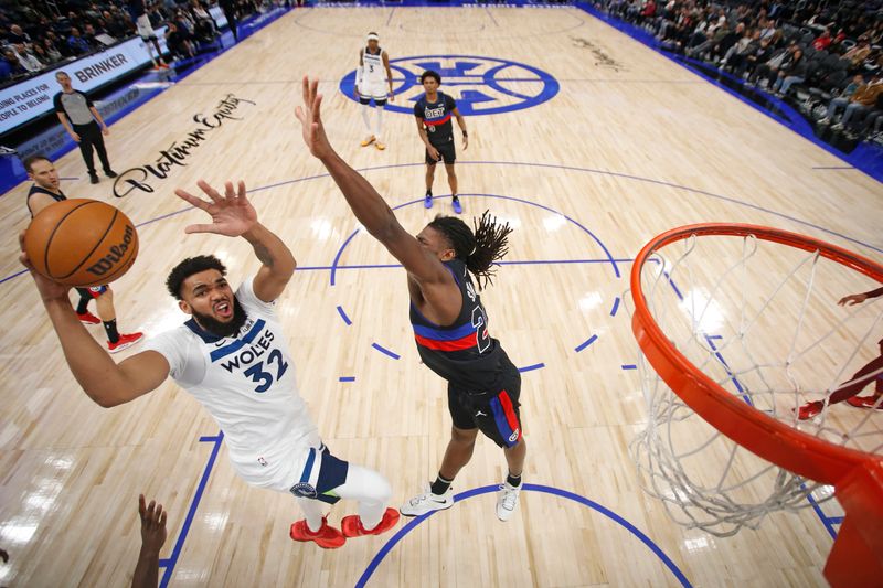 DETROIT, MI - JANUARY 17: Karl-Anthony Towns #32 of the Minnesota Timberwolves shoots the ball during the game against the Detroit Pistons on January 17, 2024 at Little Caesars Arena in Detroit, Michigan. NOTE TO USER: User expressly acknowledges and agrees that, by downloading and/or using this photograph, User is consenting to the terms and conditions of the Getty Images License Agreement. Mandatory Copyright Notice: Copyright 2024 NBAE (Photo by Brian Sevald/NBAE via Getty Images)