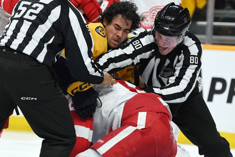 Mar 23, 2024; Nashville, Tennessee, USA; Nashville Predators left wing Kiefer Sherwood (44) and Detroit Red Wings center Andrew Copp (18) have to be separated by officials after a play during the first period at Bridgestone Arena. Mandatory Credit: Christopher Hanewinckel-USA TODAY Sports