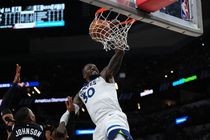 SAN ANTONIO, TX - NOVEMBER 2: Julius Randle #30 of the Minnesota Timberwolves dunks the ball during the game against the San Antonio Spurs on November 2, 2024 at the Frost Bank Center in San Antonio, Texas. NOTE TO USER: User expressly acknowledges and agrees that, by downloading and or using this photograph, user is consenting to the terms and conditions of the Getty Images License Agreement. Mandatory Copyright Notice: Copyright 2024 NBAE (Photos by Cooper Neill/NBAE via Getty Images)